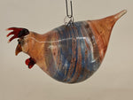 Hängendes Huhn aus Glas